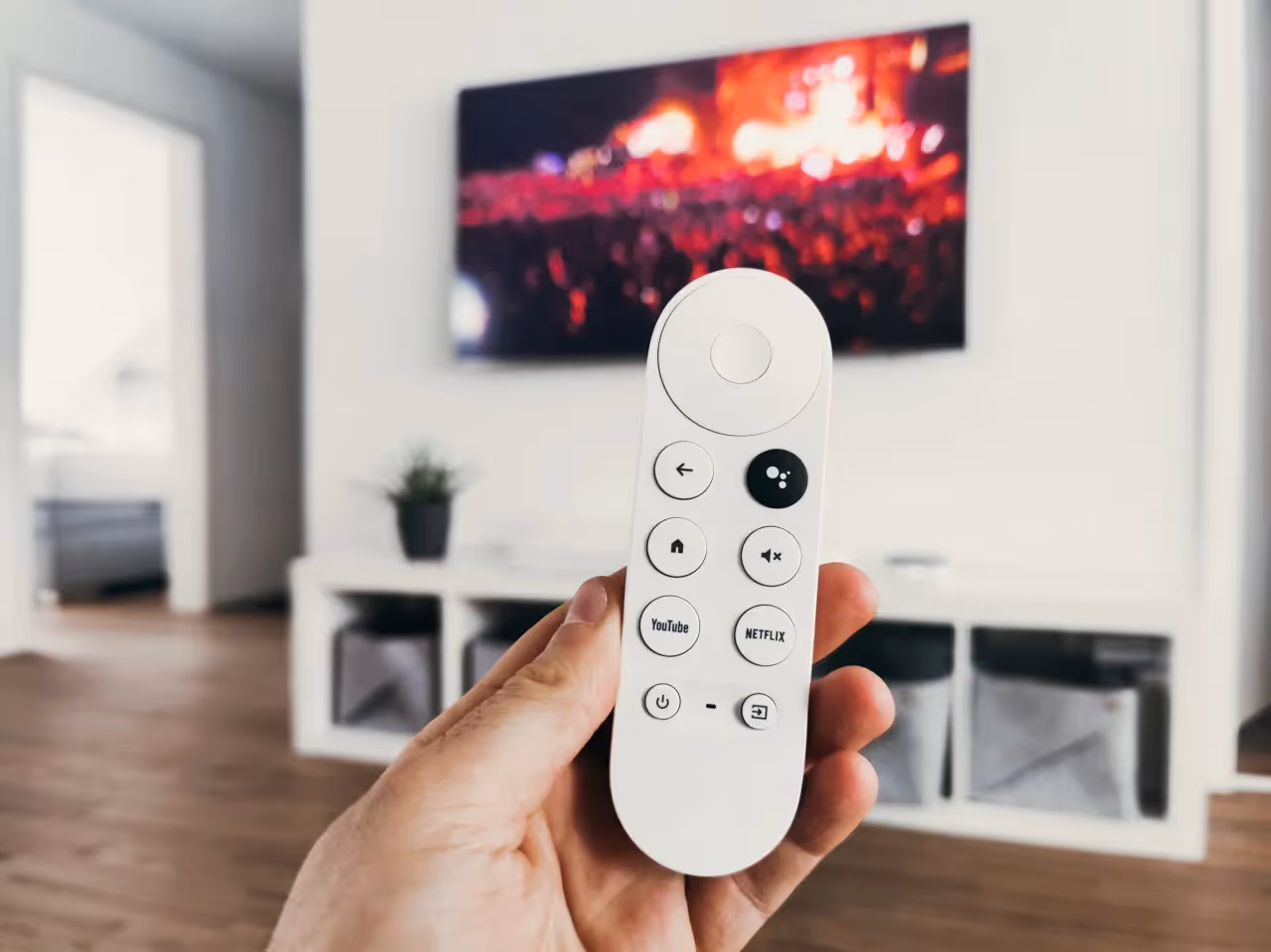 Person holding a remote control