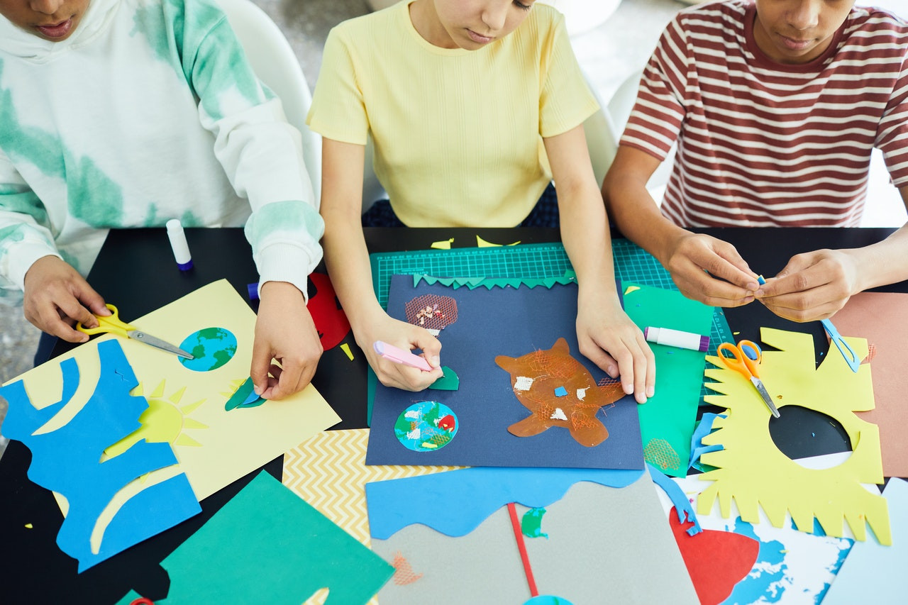 kids crafting with paper