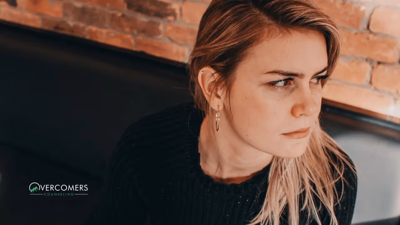 a person looking angrily to their left