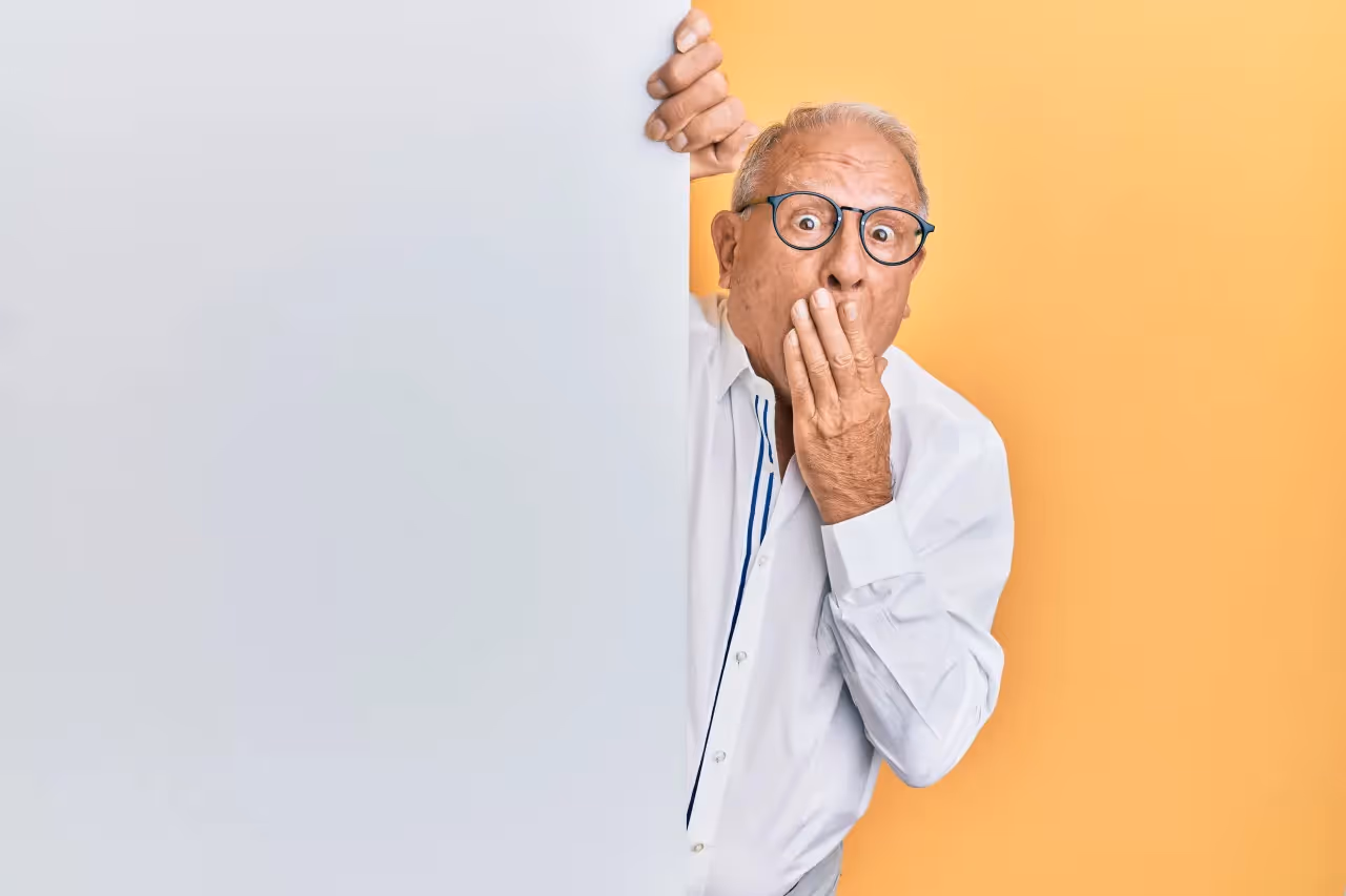 A man telling someone to not talk out about something.