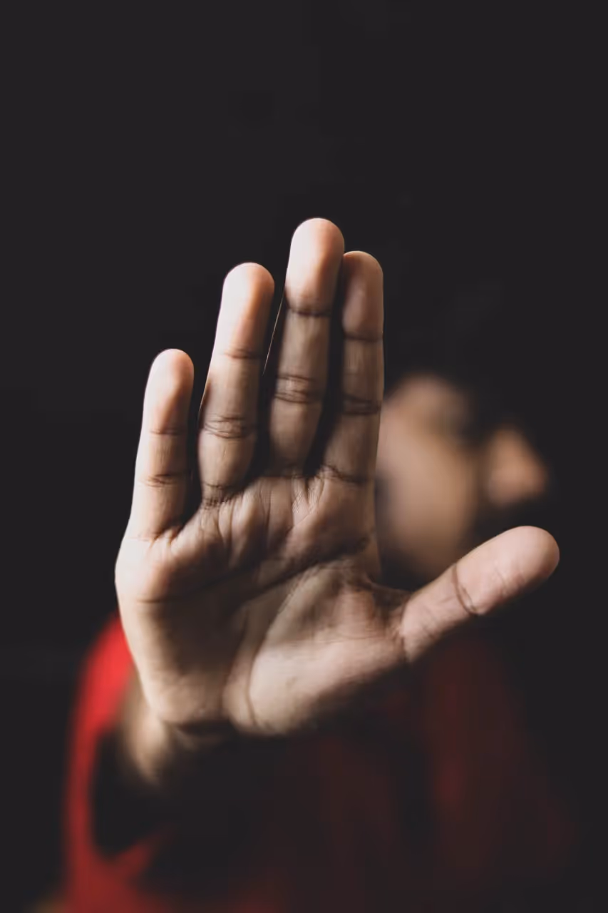 A person telling someone to stop.