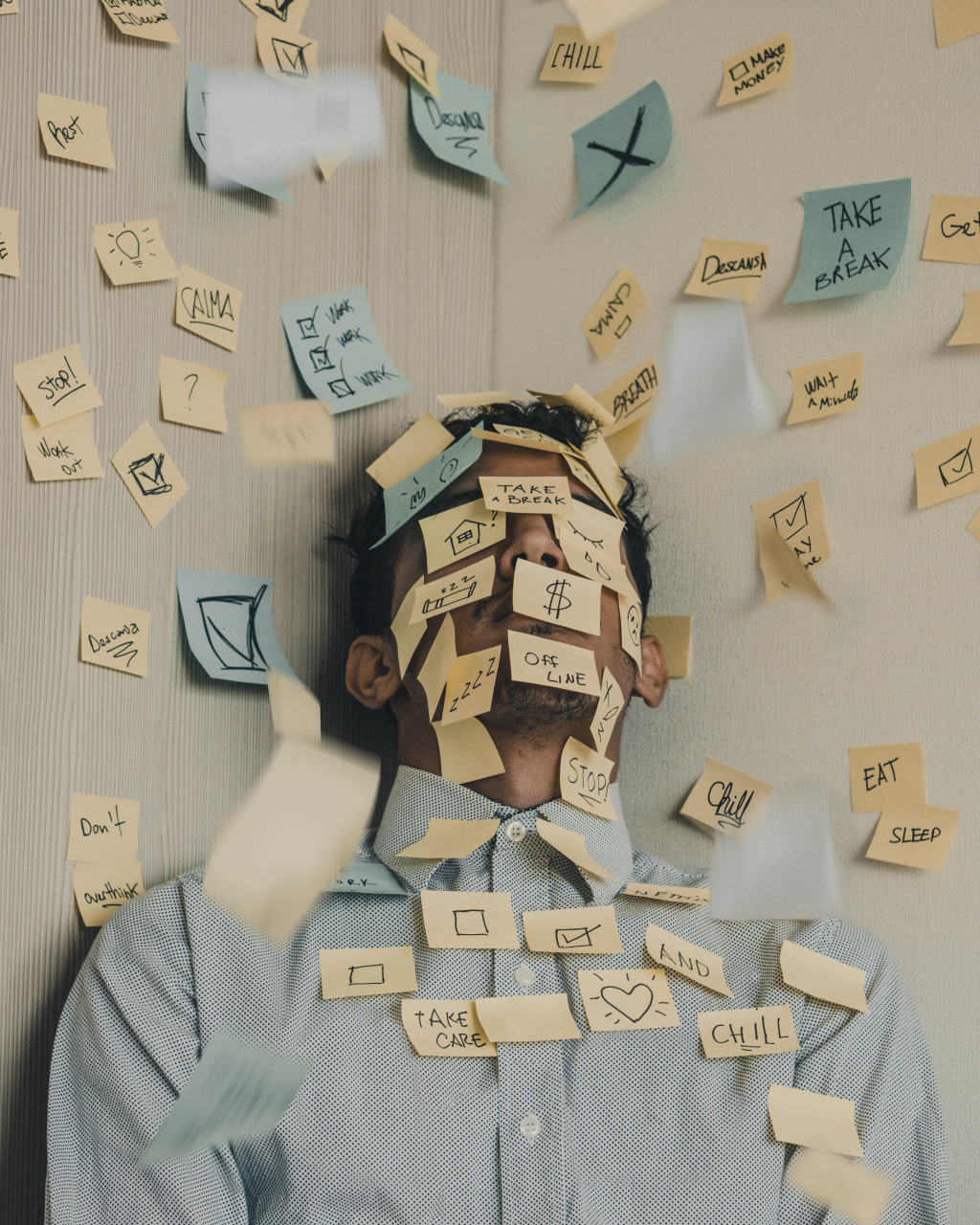 A man lying in a pool of stress management flashcards.