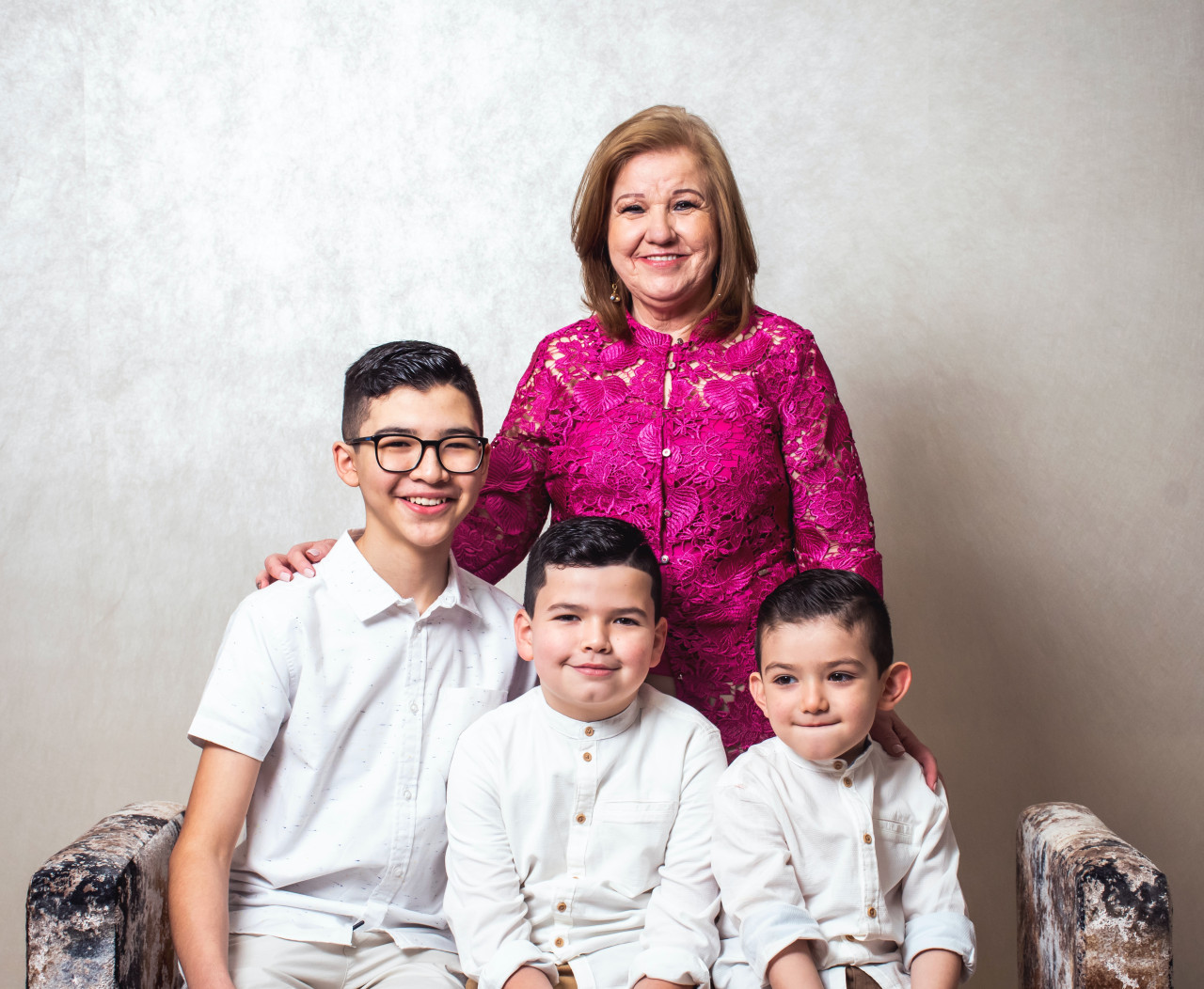 A family posing together for a picture.