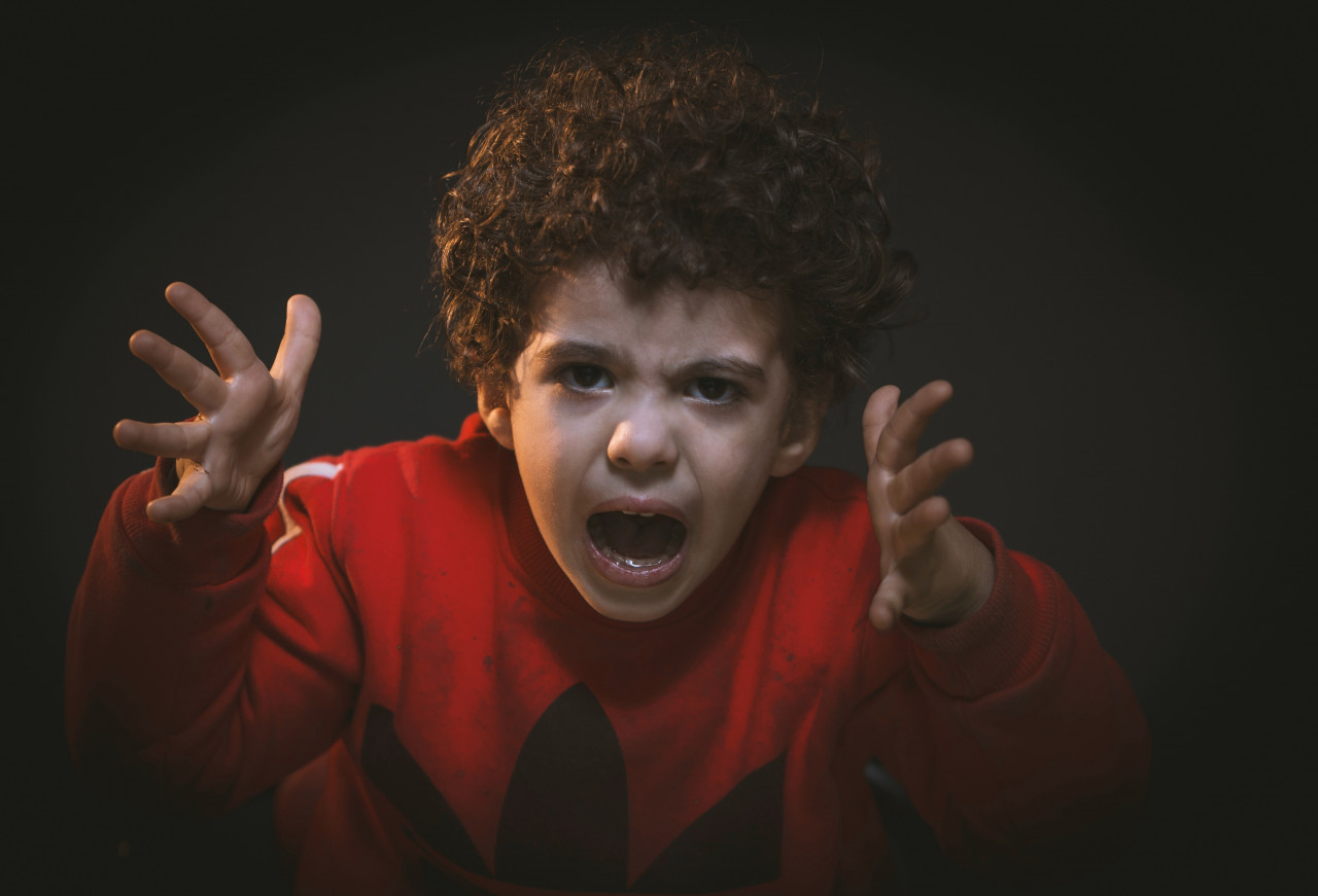 A child yelling.