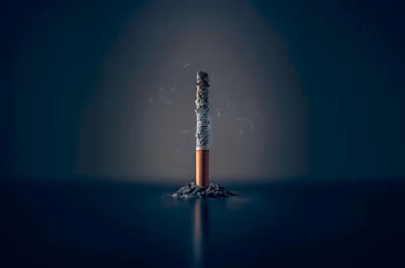 a cigarette burning to the filter