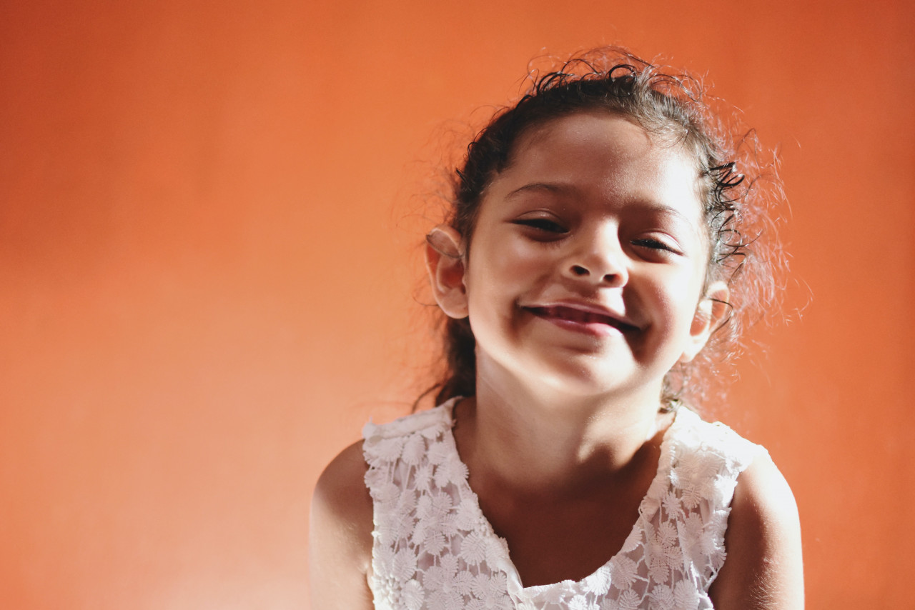a little girl smiling