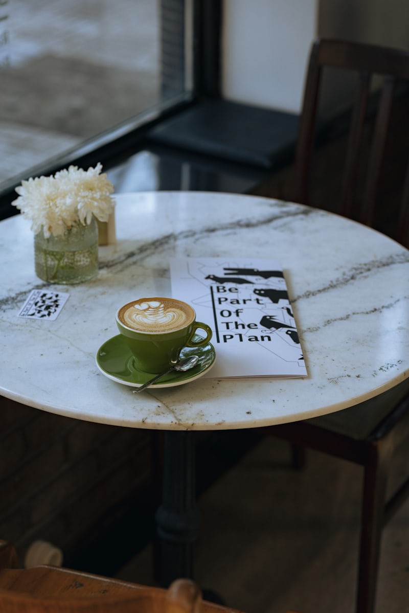 a latte on a coffee table