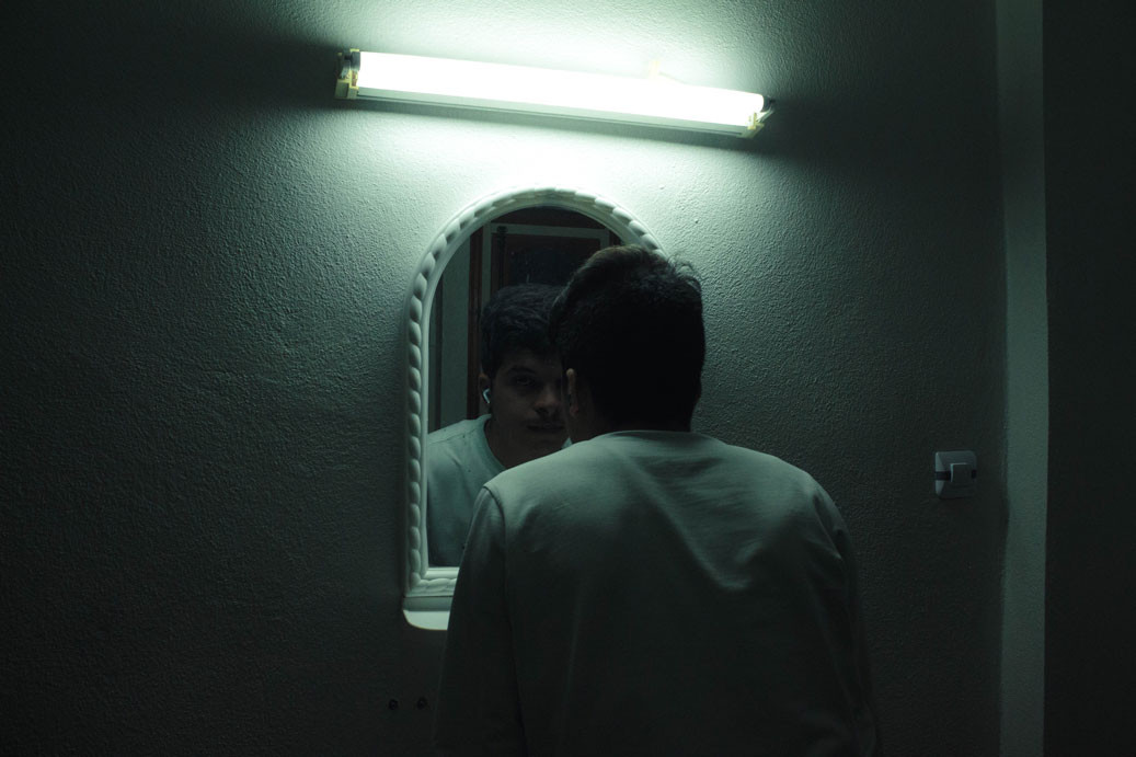 a person looking at themselves in a mirror