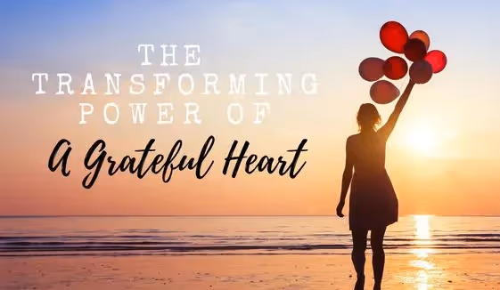 A woman holding ballons and a quote that says The Transforming Power of a Grateful Heart