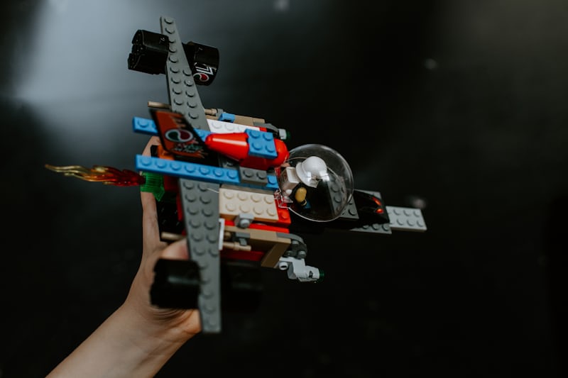 a child playing with a spaceship legos