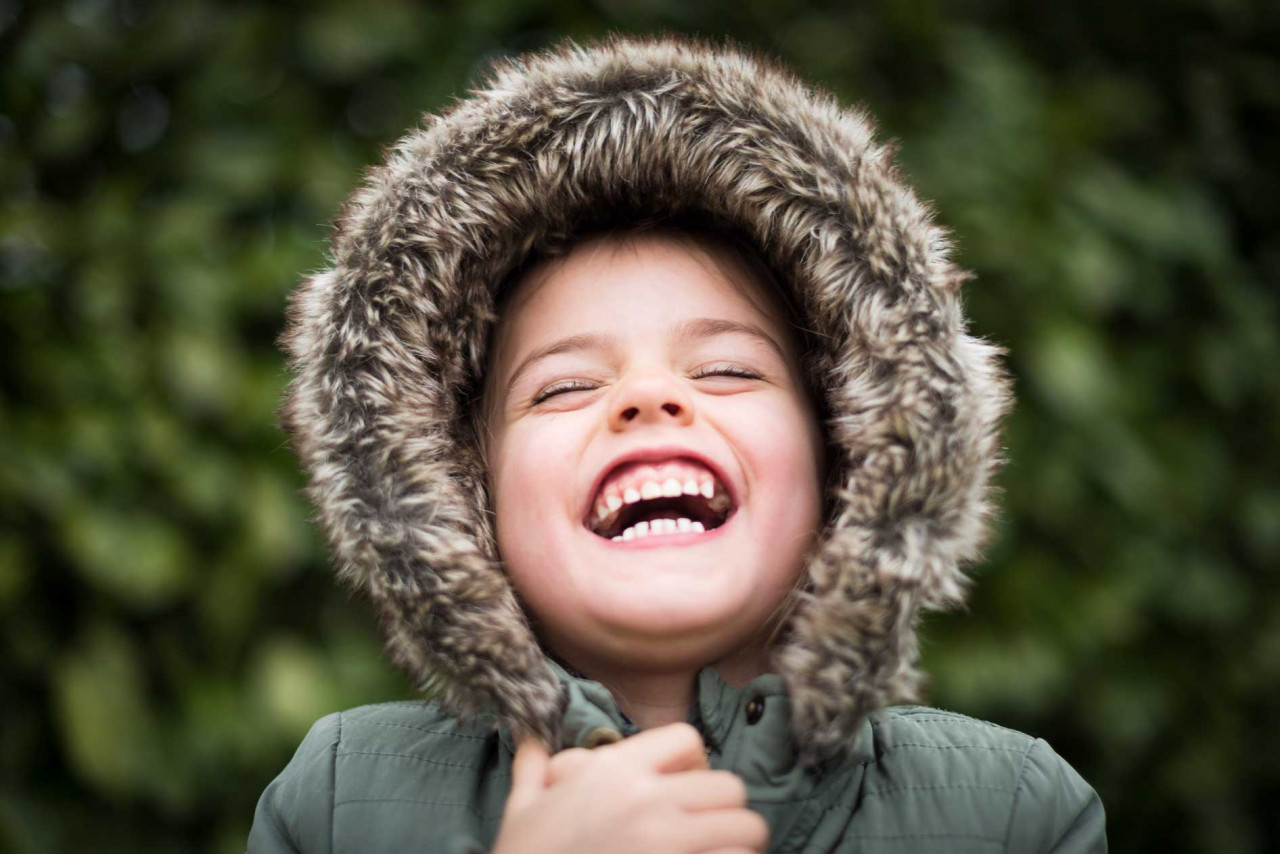 a young child smiling