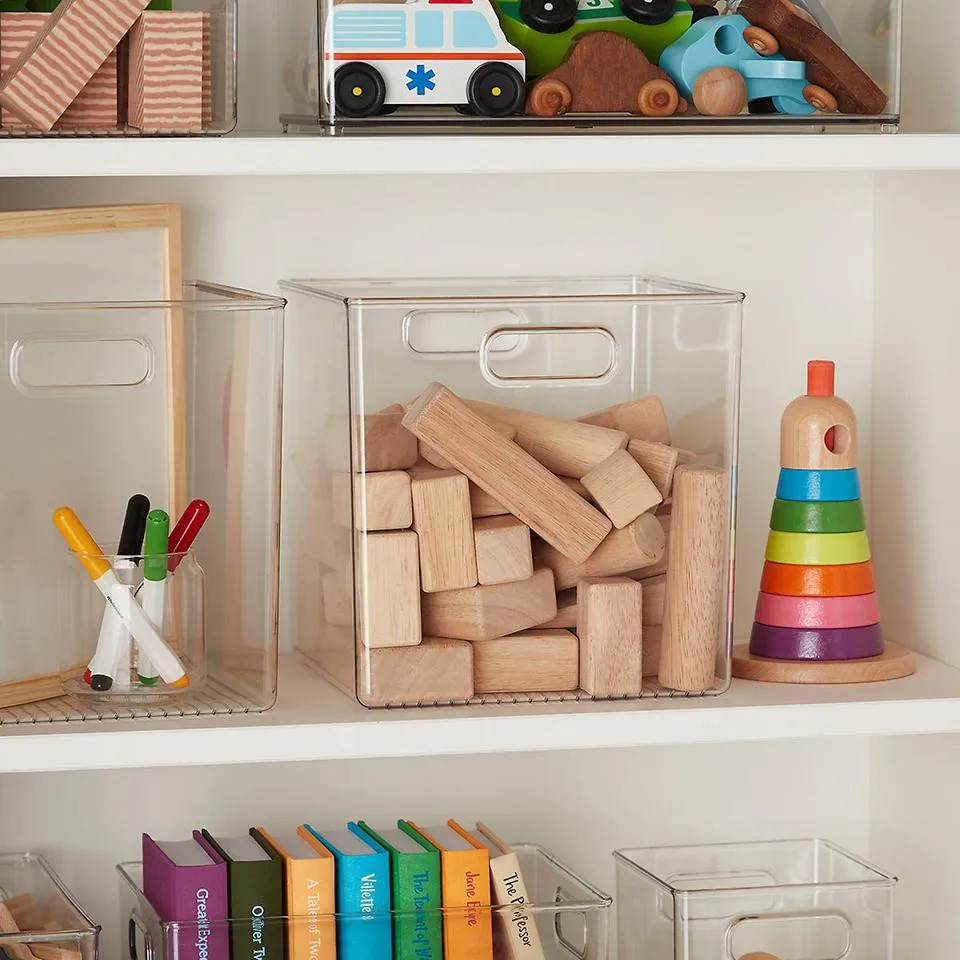 Wooden toys and books organized on shelving units