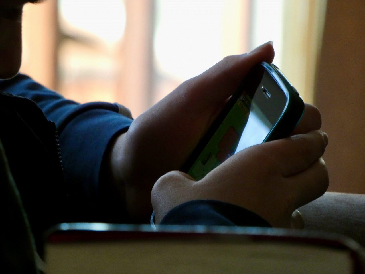 hands holding on a mobile device