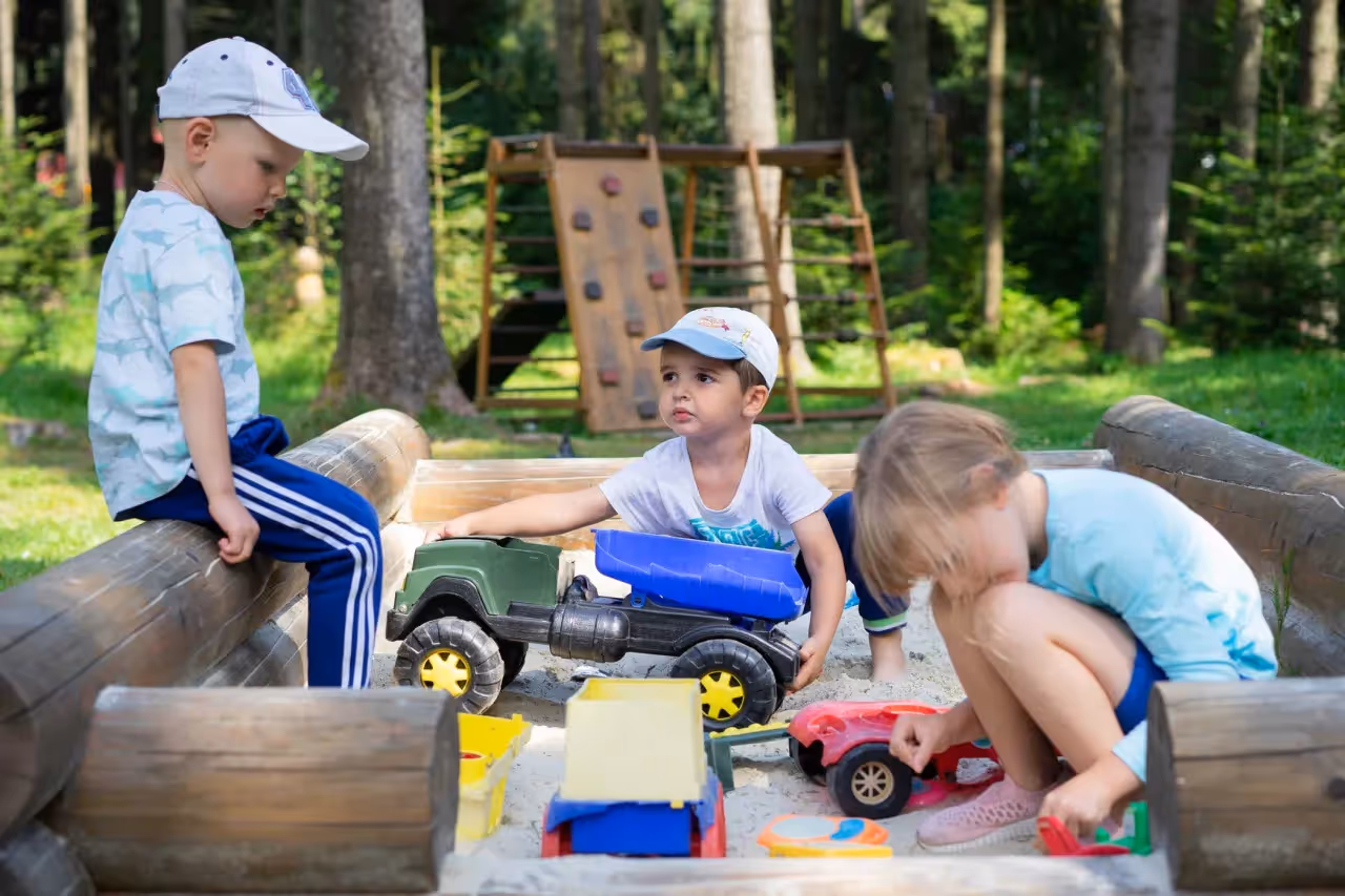 kids playing with toys together outside