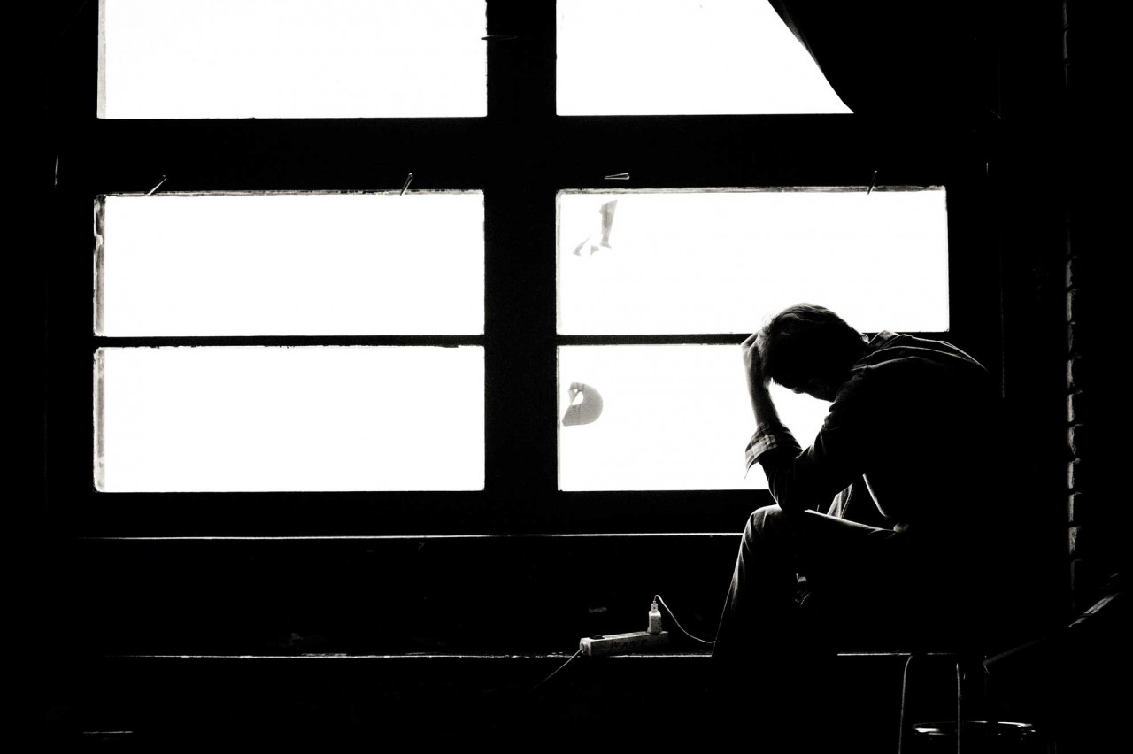 a person looking out the window