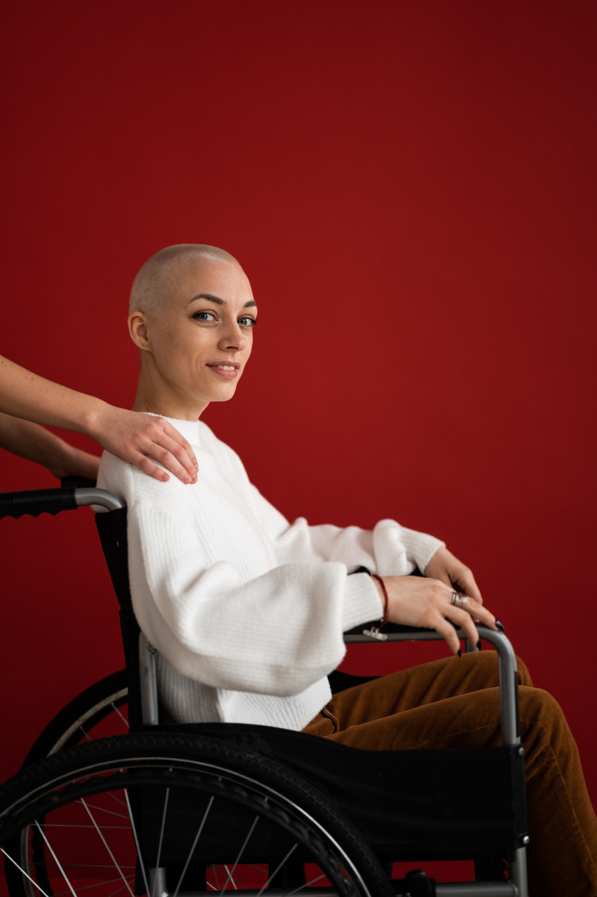 A cancer patient in a wheelchair.