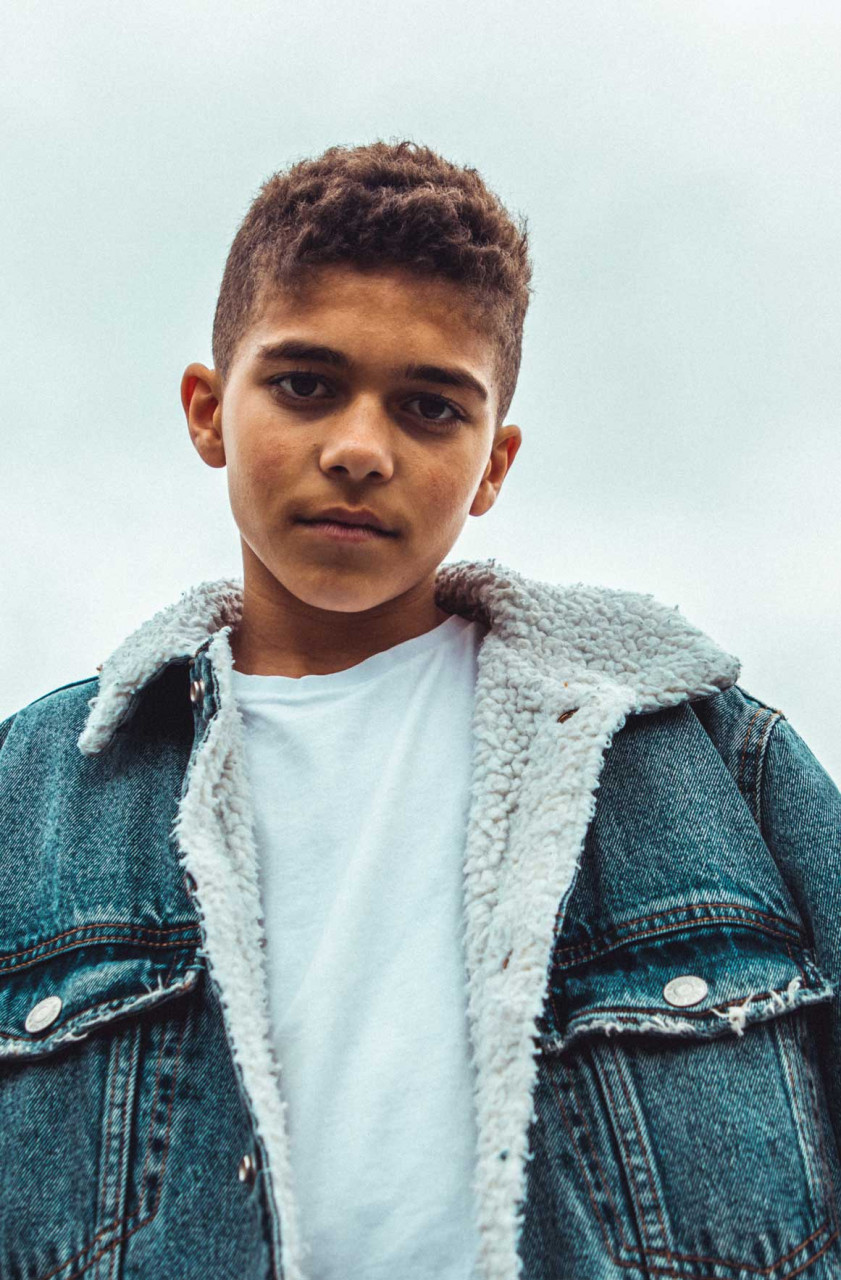 a young teen looking angry