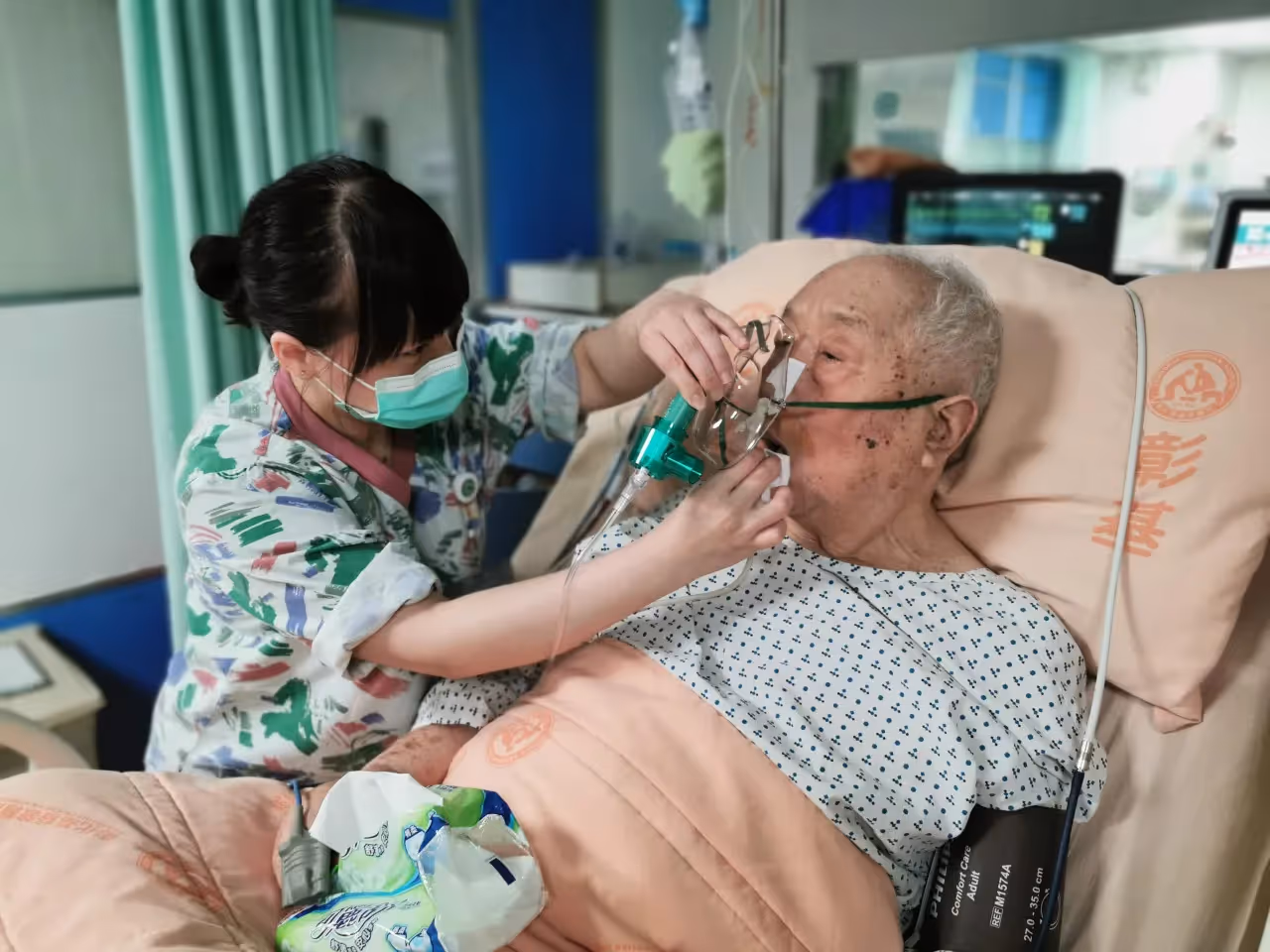 A man receiving oxygen support.