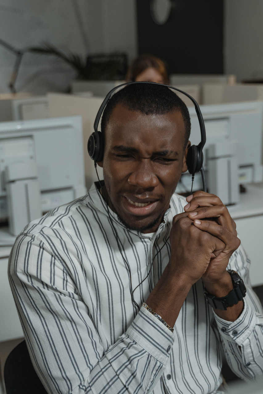 A man hearing about the death of his colleague.