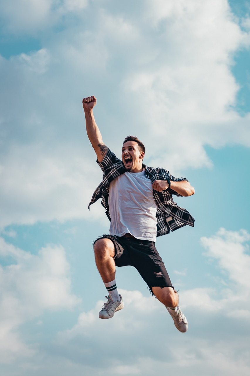 A man leaping in happiness.