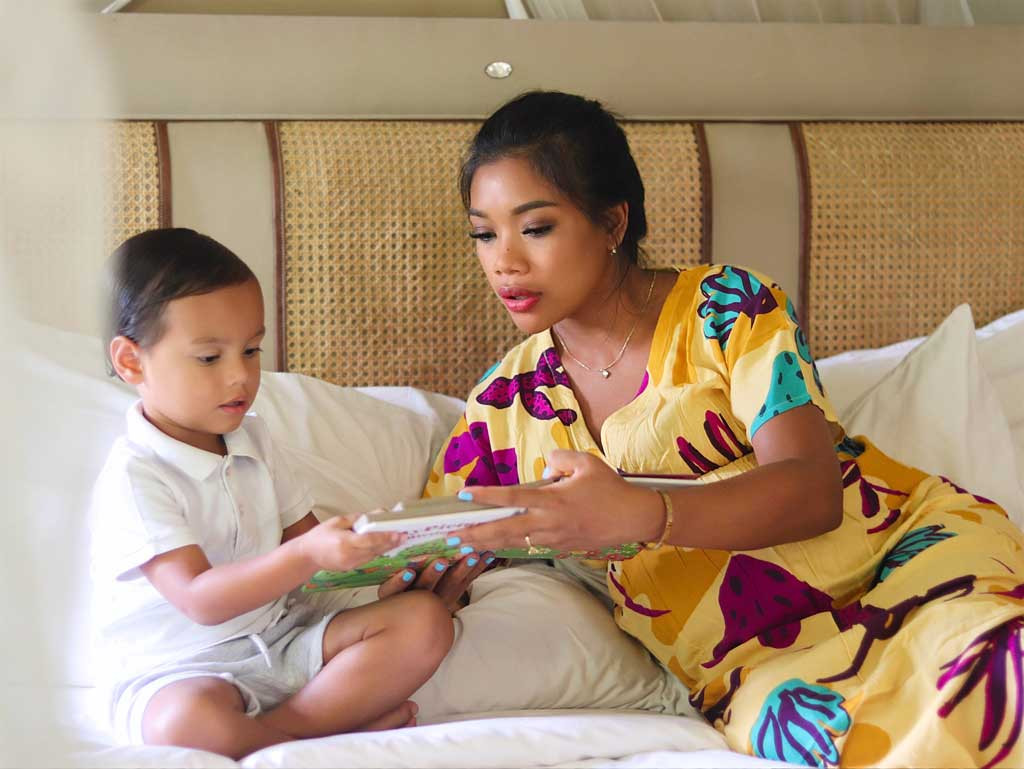 a parent reading to a child