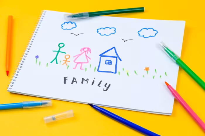 a coloring of a family on paper