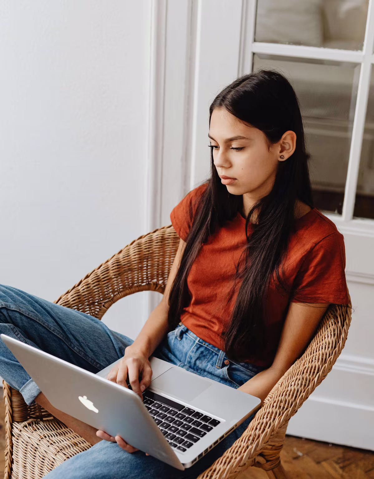 Teen sitting indoors during a counseling session