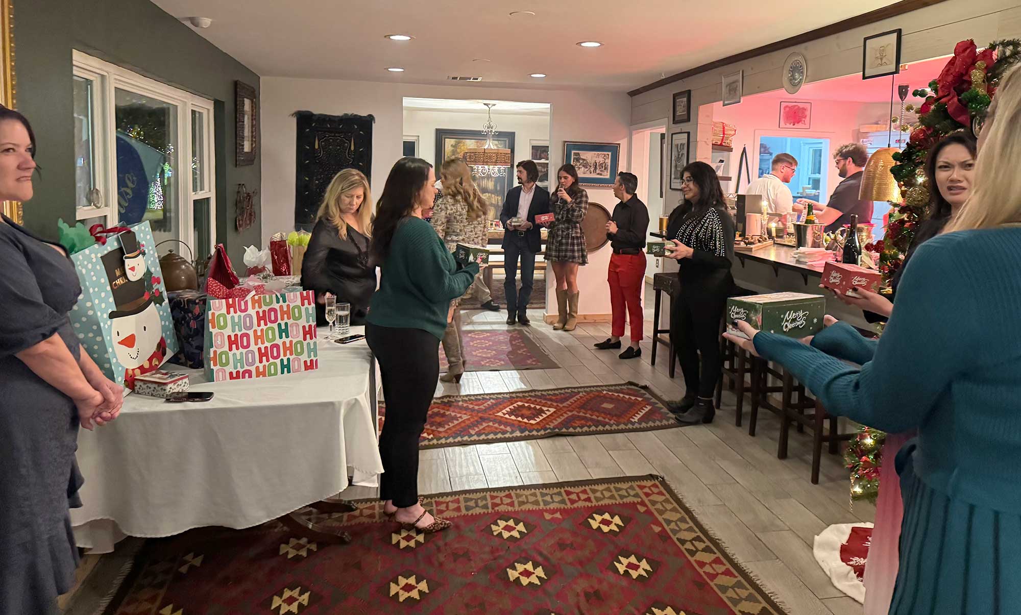 The THS staff gets together for a bit of festive cheer at the company Christmas party on December 11.