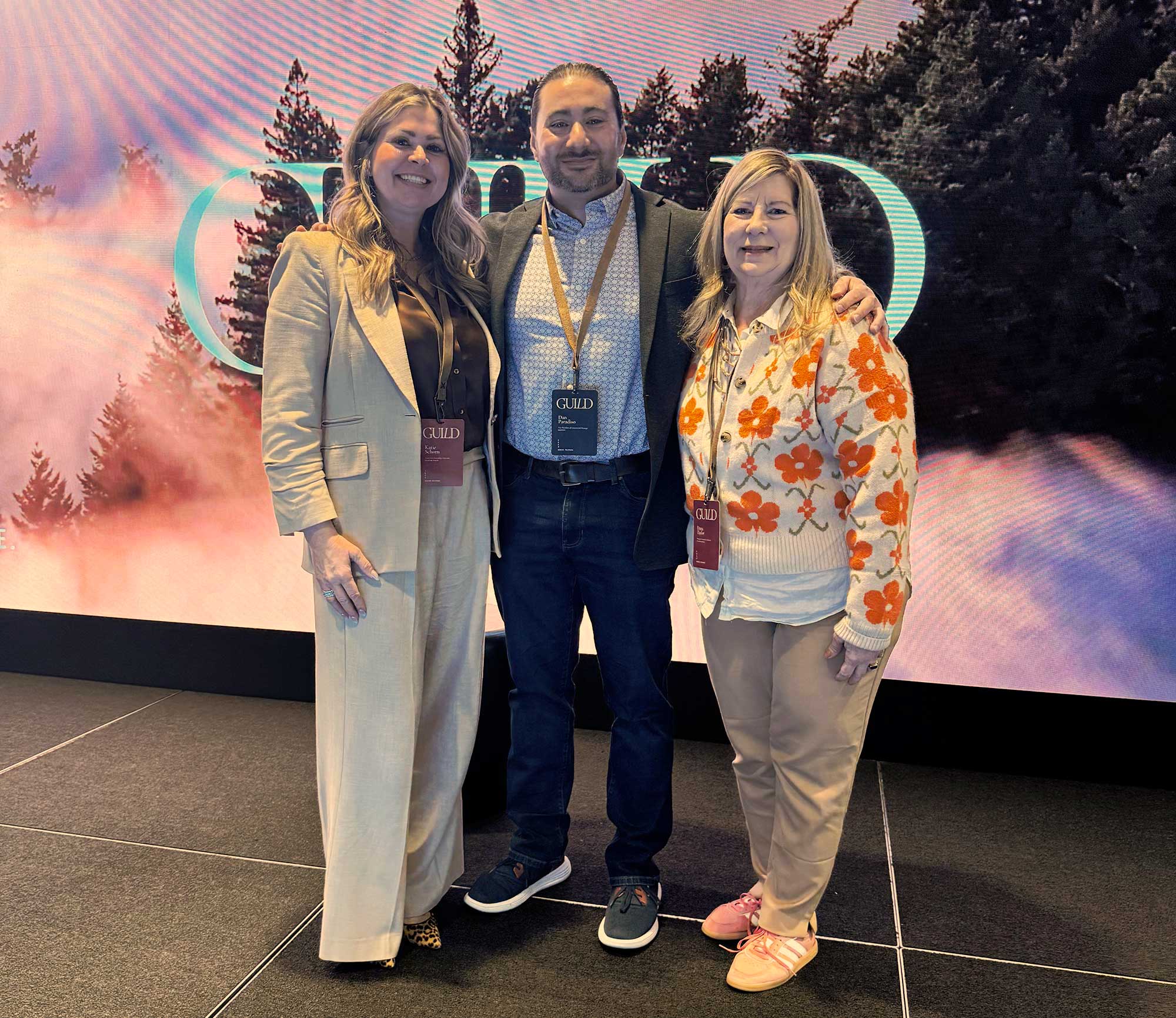 Katie Schorn speaks with Dan Paradiso, Makeready vice president of commercial strategy, and Dana Foley-Taylor during the company’s conference.