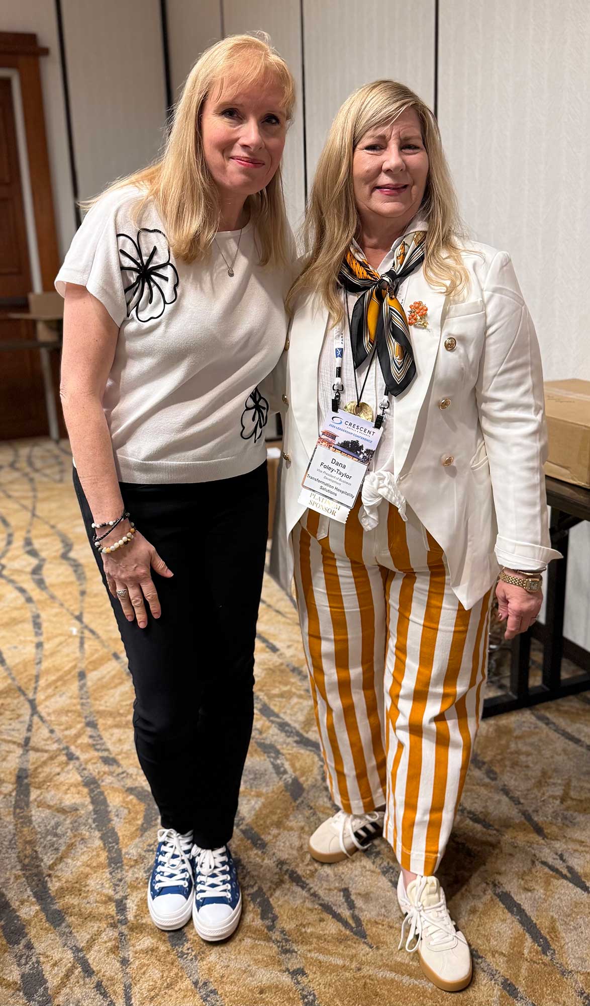 Dana Foley-Taylor chats with Jeanette Costa, Crescent Hotels & Resorts senior vice president of commercial integrations, during the conference.