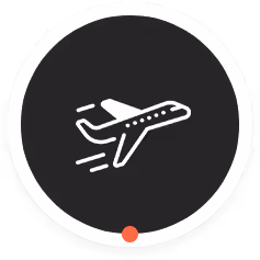 White airplane icon with motion lines inside a black circle with a thin white border and a small red dot at the bottom center.