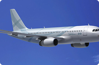 Modern commercial airplane flying against a clear blue sky.