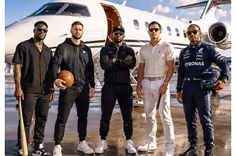 Five men with sports equipment standing in front of a private jet on an airstrip.