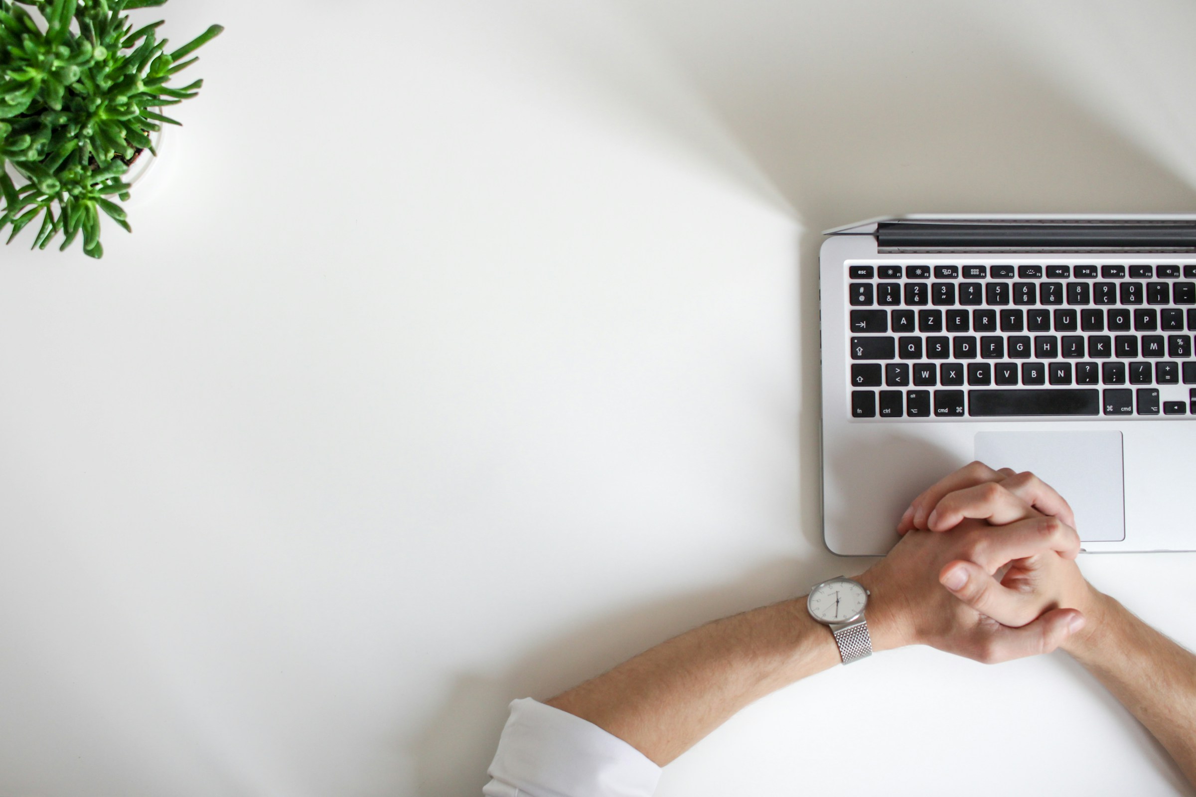 Person Sitting in Front of Laptop - Futures Swing Trading