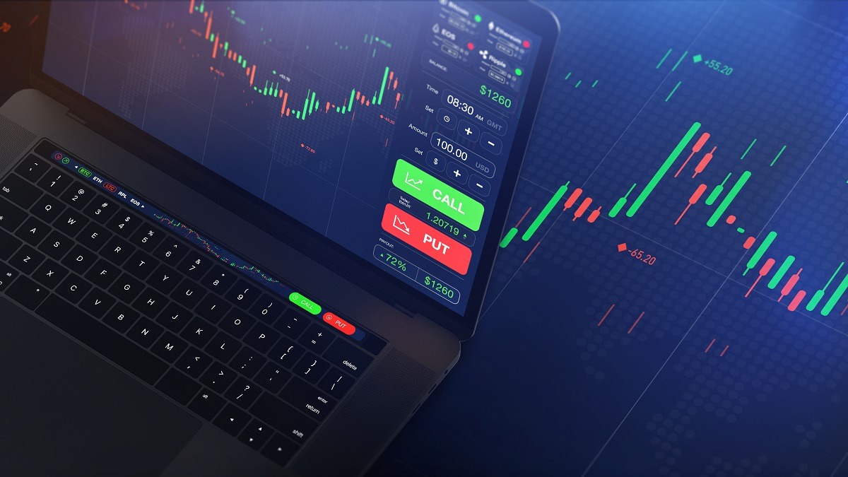 trading chart on a laptop - How Much To Trade Futures	