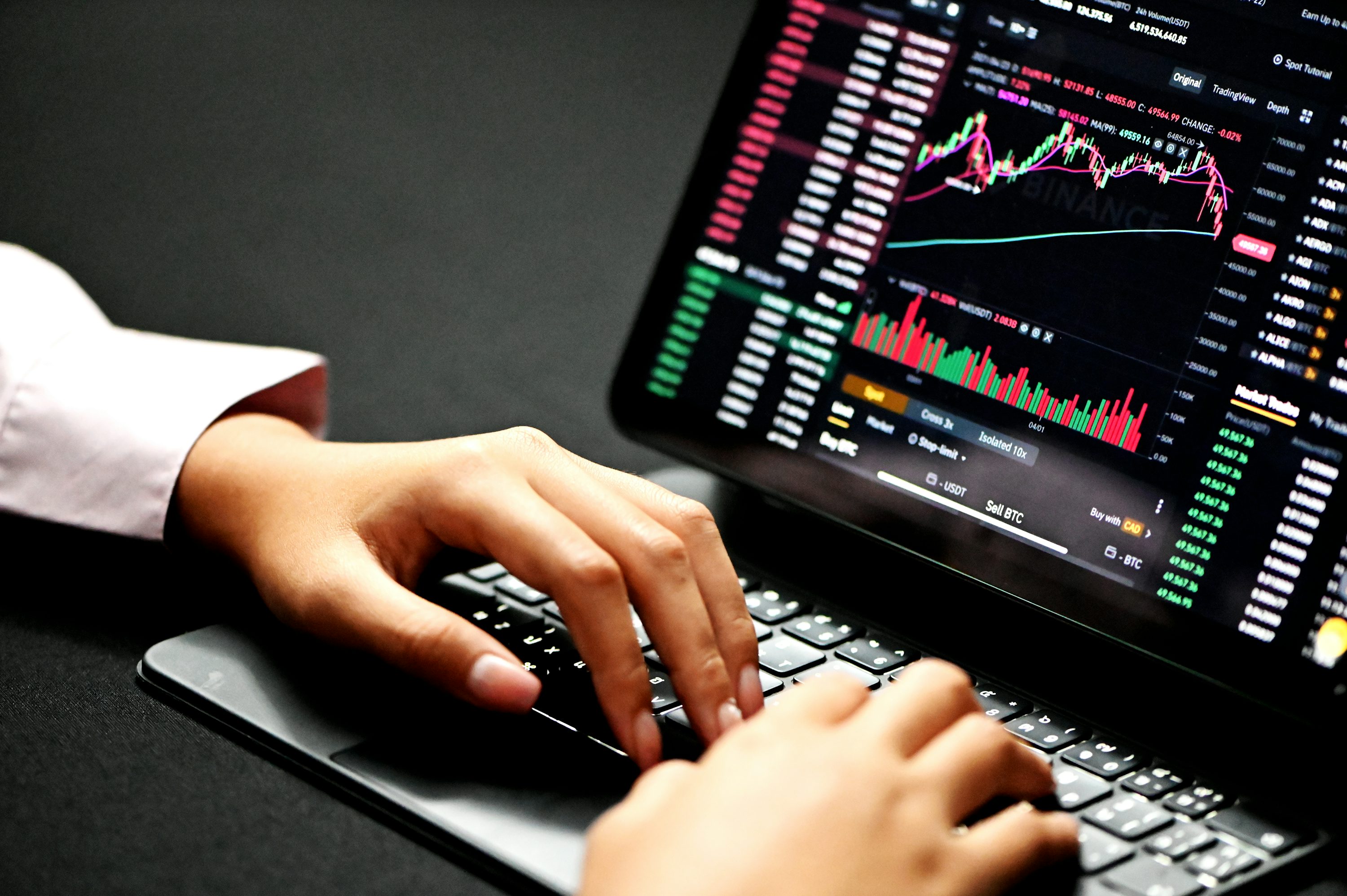 person using black laptop computer - Practice Futures Trading