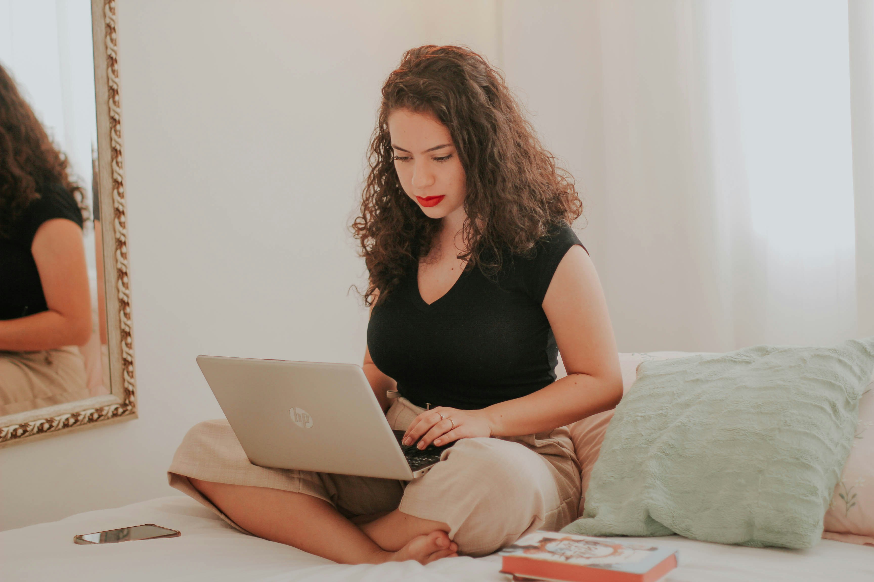 woman using a laptop - How To Trade In Currency Futures		