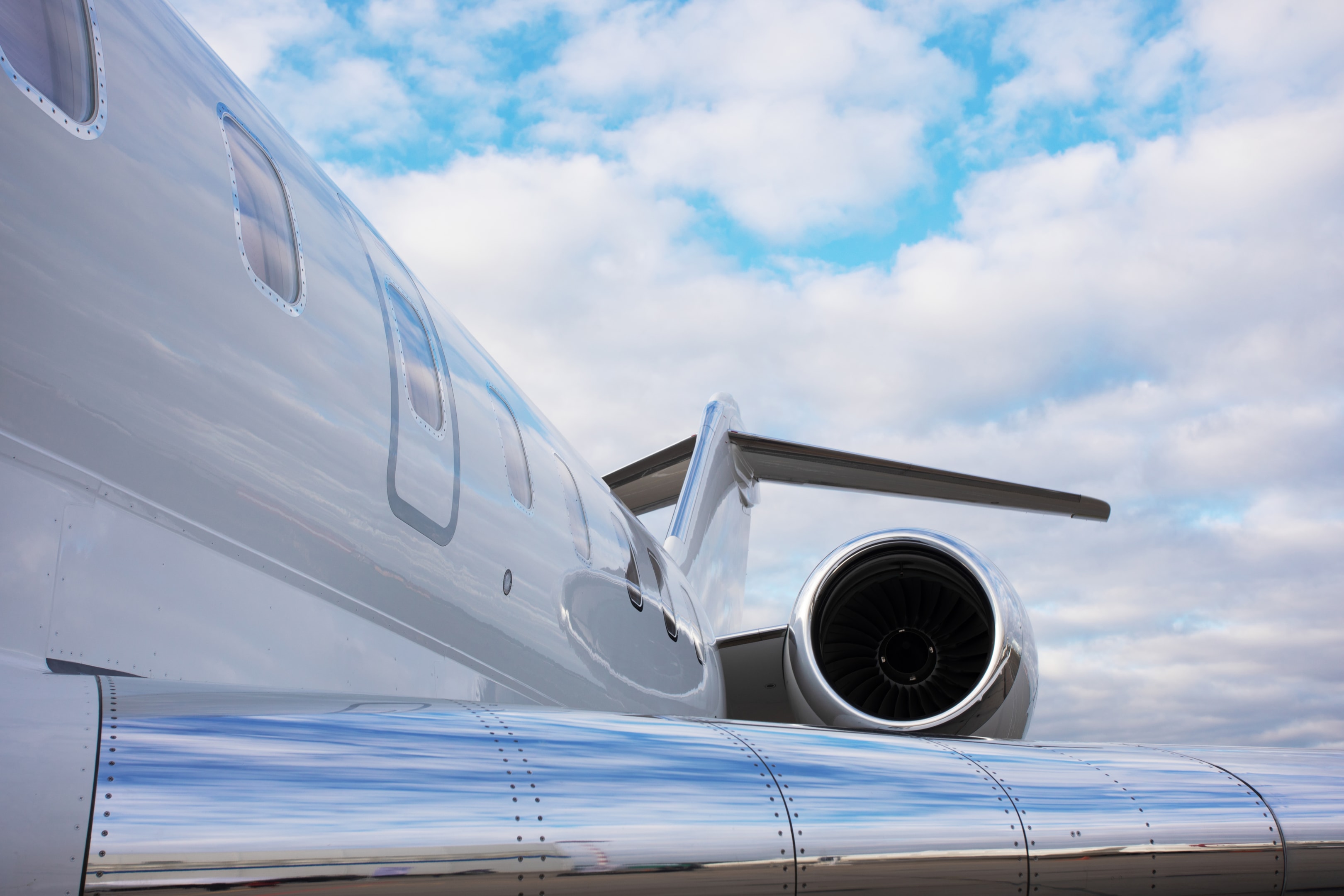    part of modern private jet airplane with a tail and wing over sky background Downloaded  Save to Library  Preview Crop  Find Similar   File #:  471345973 part of modern private jet airplane with a tail and wing over sky background