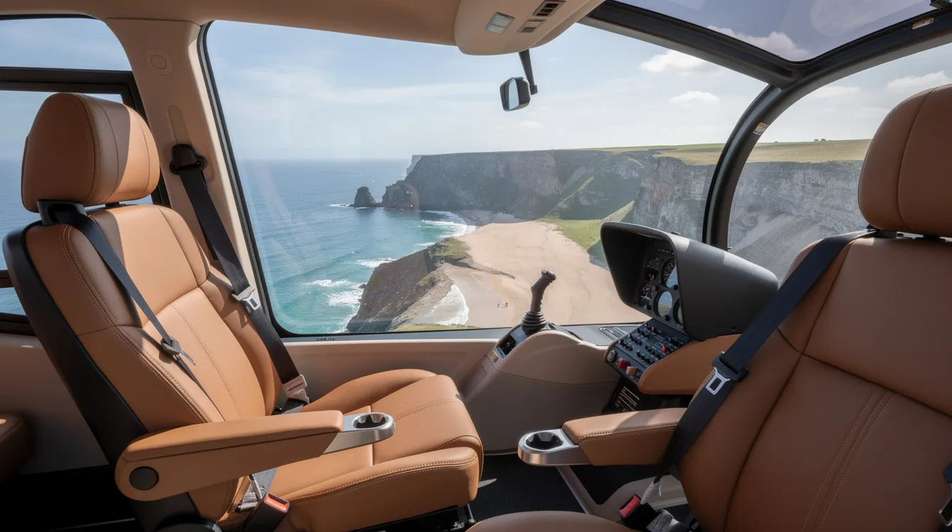 The image depicts the interior of a light helicopter, featuring luxurious leather seats and expansive panoramic windows that provide a stunning view of a coastal landscape outside. This elegant cabin design is ideal for passengers enjoying a smooth ride in a Bell 407 helicopter.