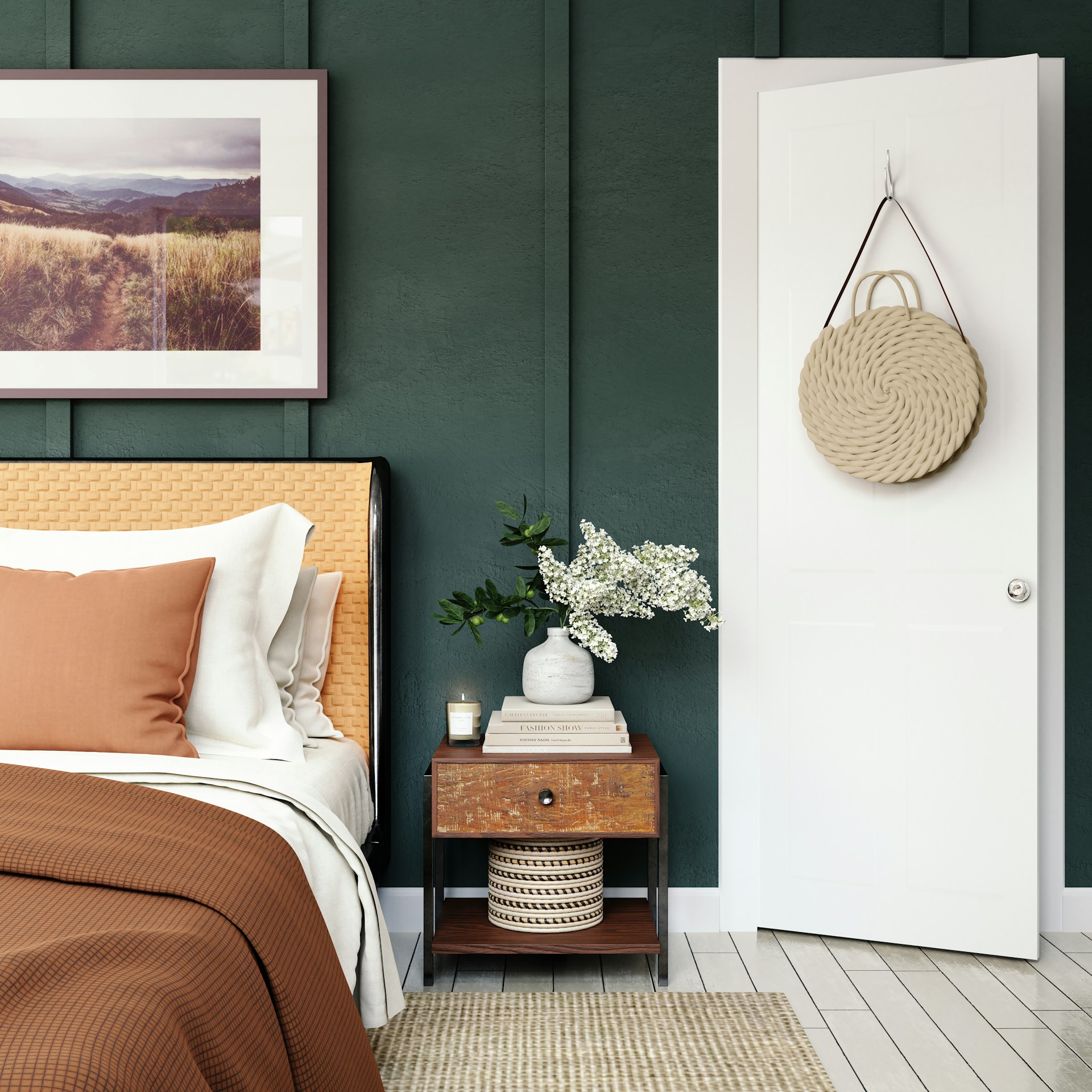 A bedroom with green walls and a white door.