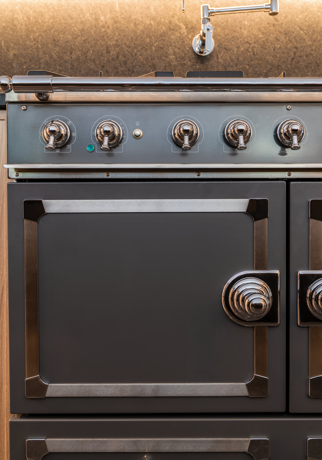 decorative oven with brushed metal fixtures