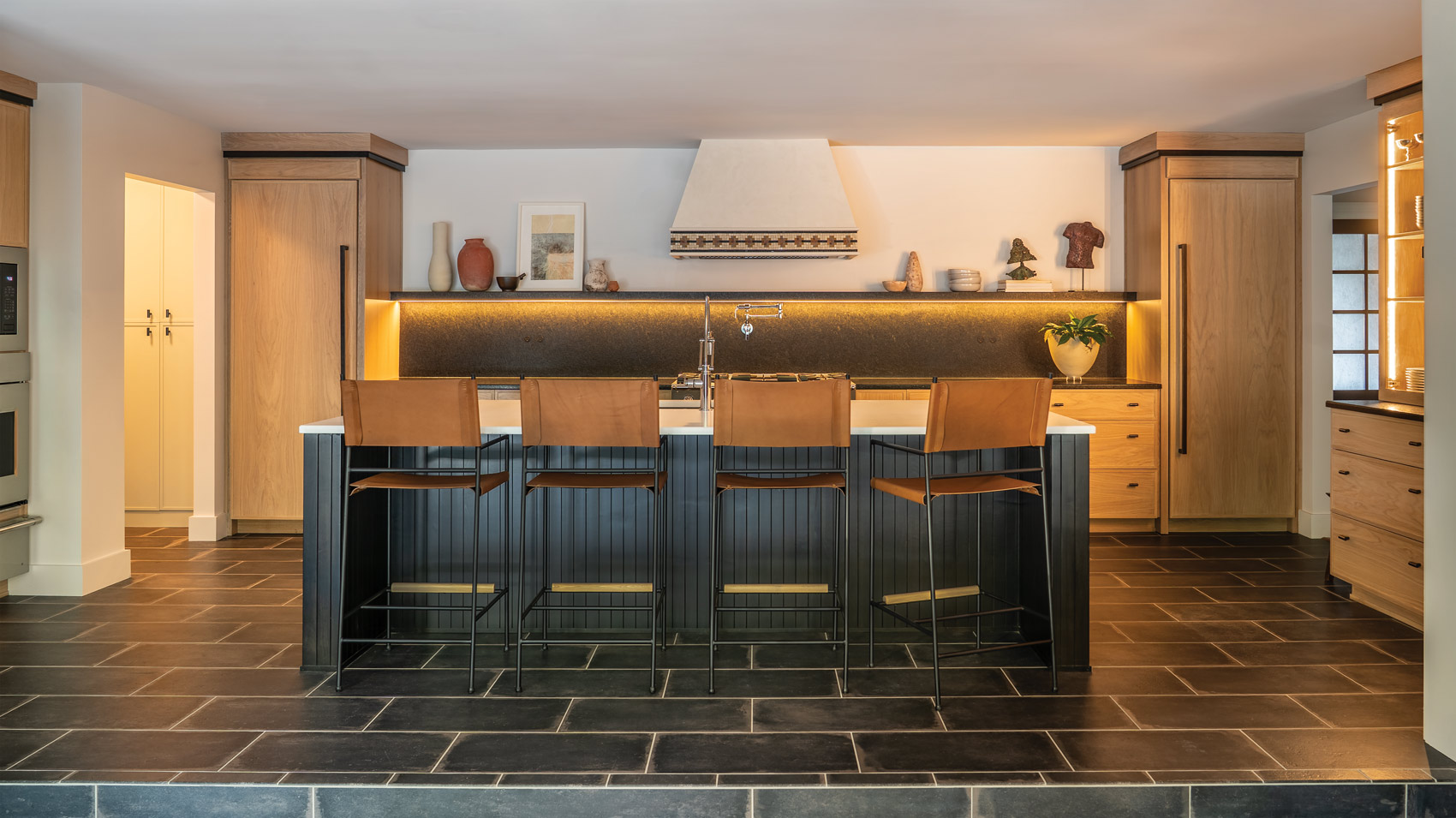 kitchen with barstool seating and custom leather seats