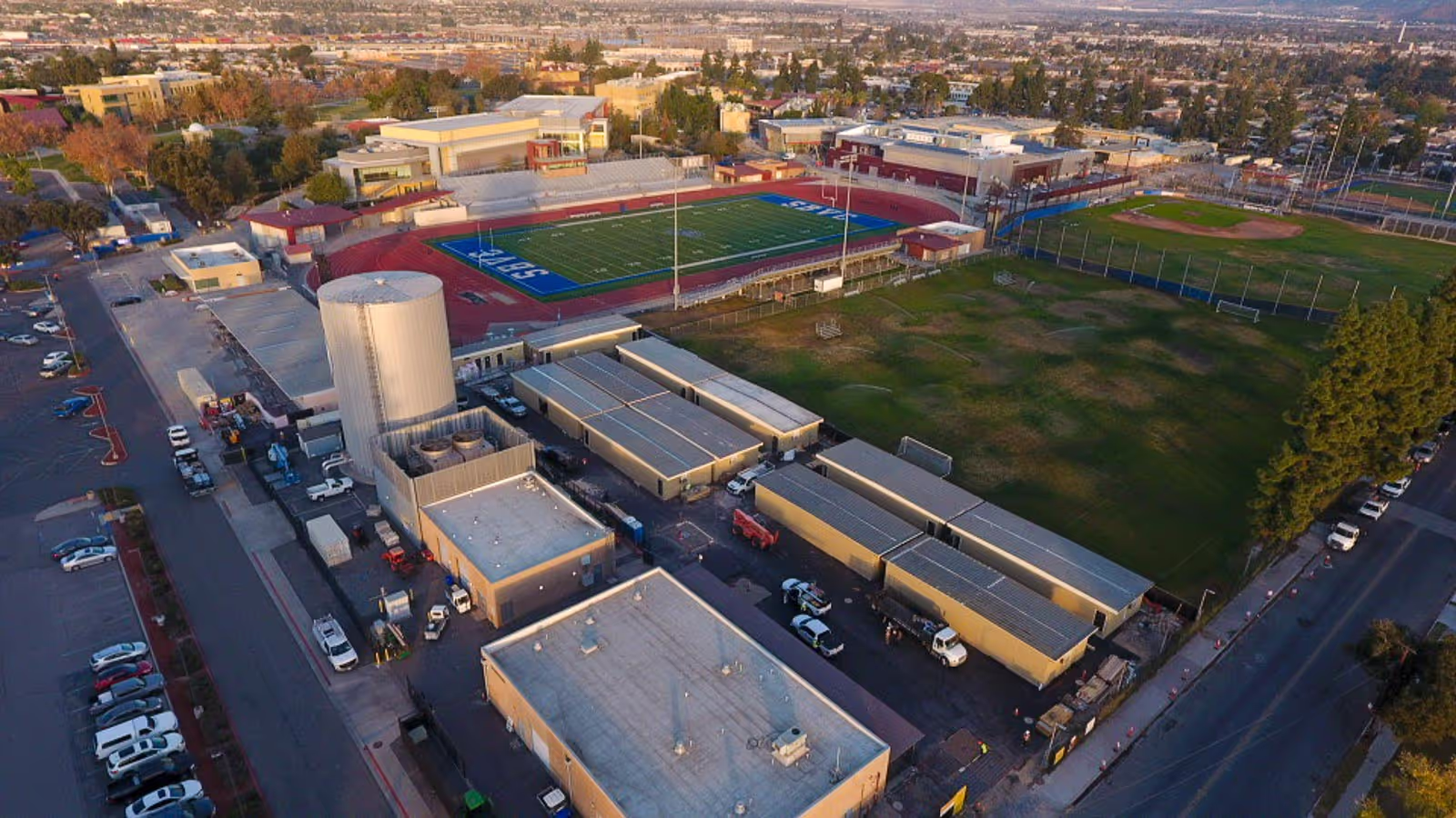 Aerial view of a school campus with modular classroom buildings