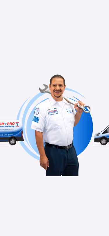 A man holding equipment in his hand and a background van