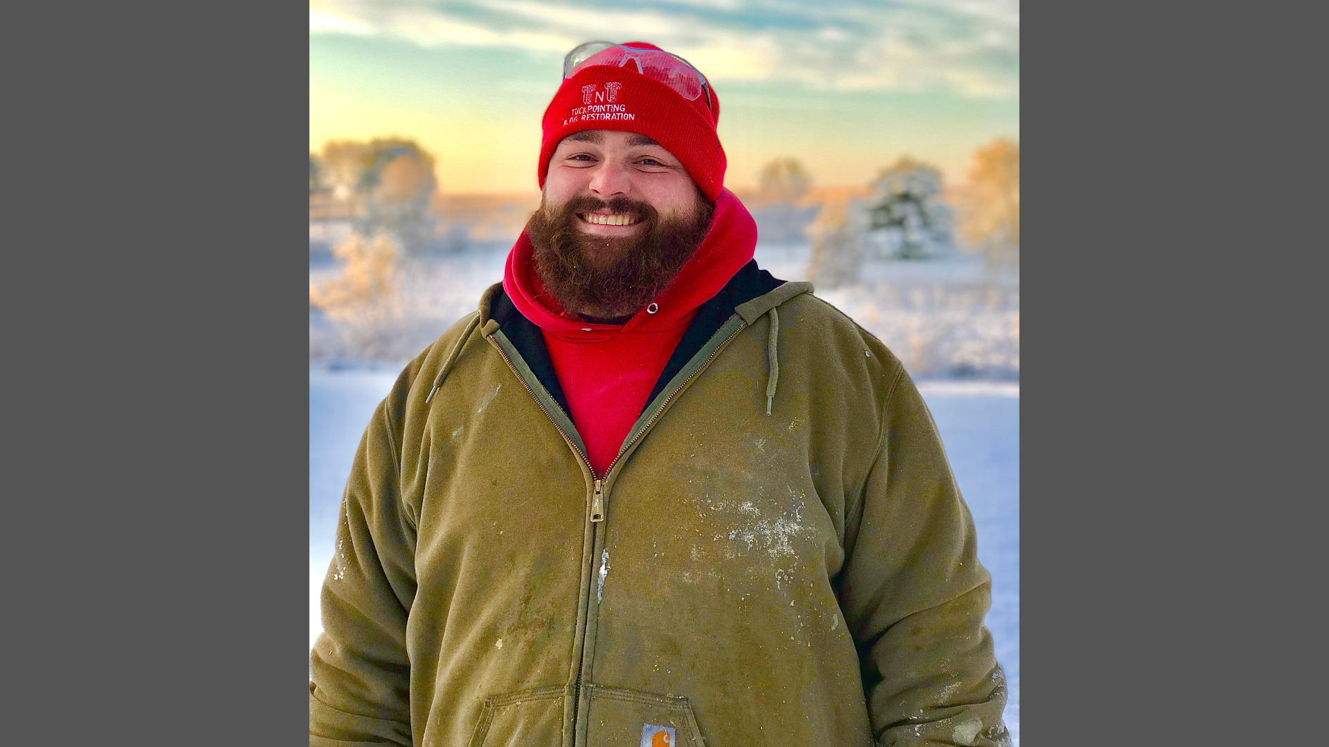 Ryan Flatley, Foreman at TNT Tuckpointing, with his two dogs Ace and Winter