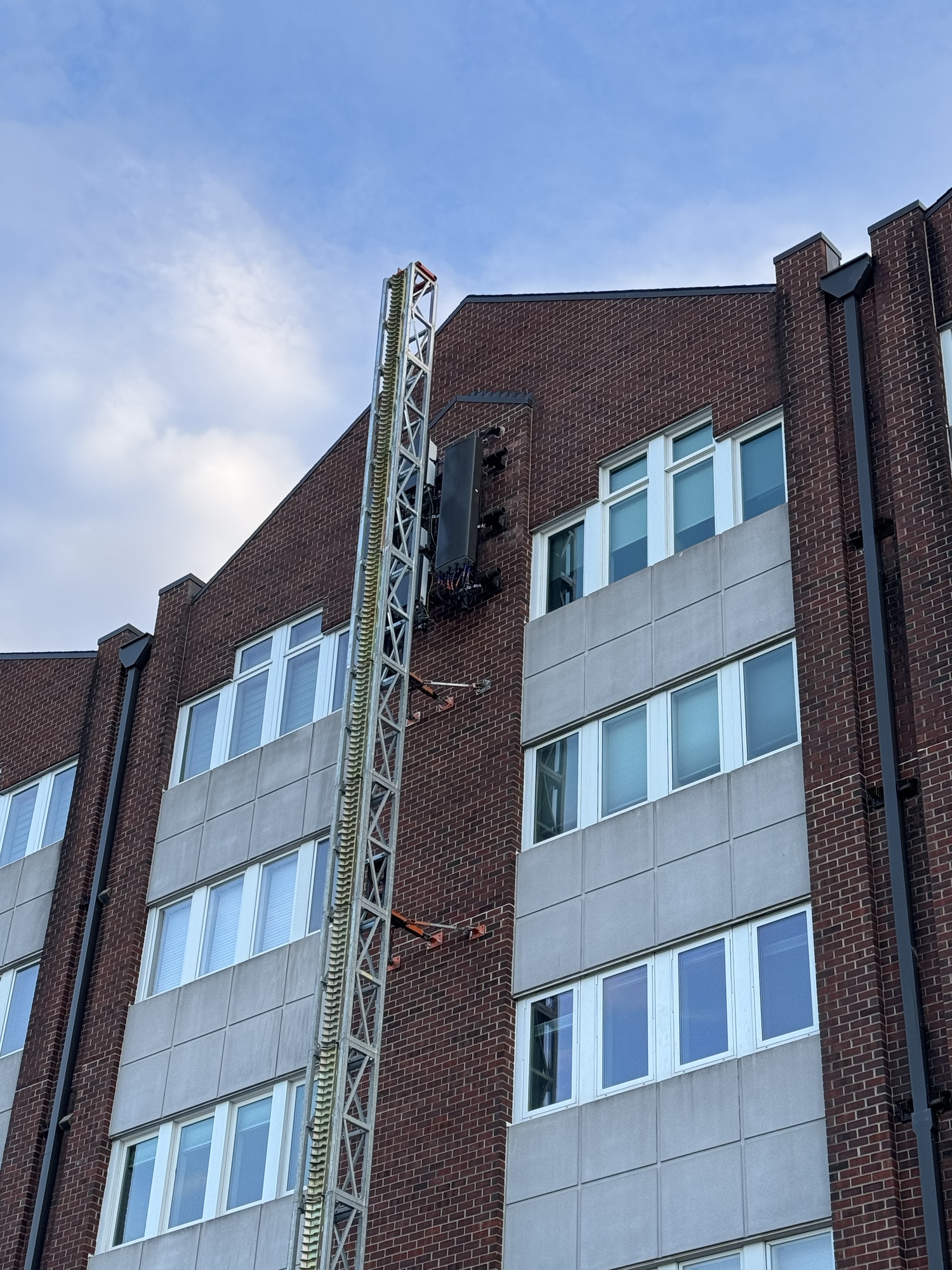 Third elevation masonry repair nearing completion at 111 Cottage Grove, Cedar Rapids