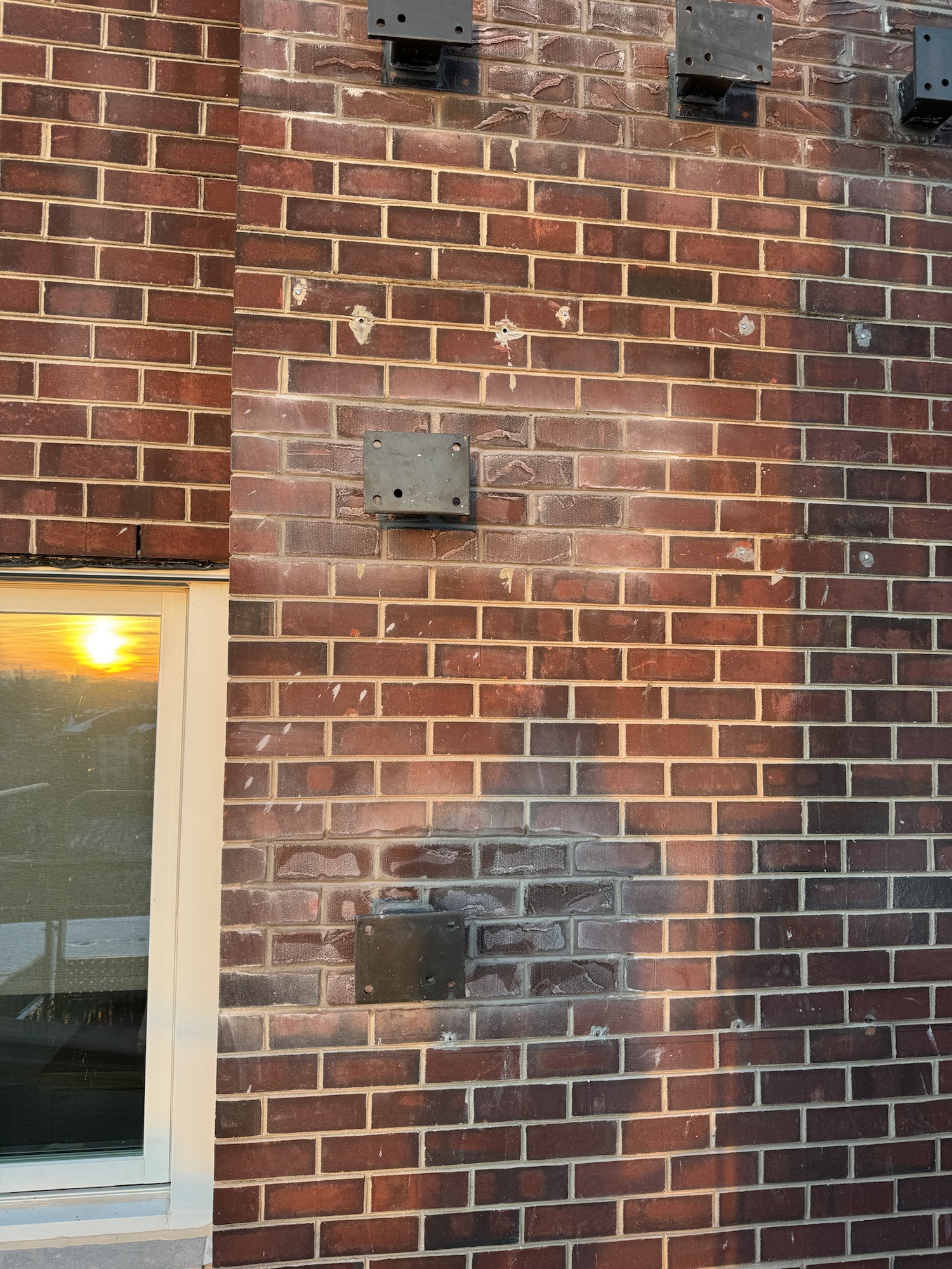 Completed masonry repair work on second elevation at 111 Cottage Grove, Cedar Rapids