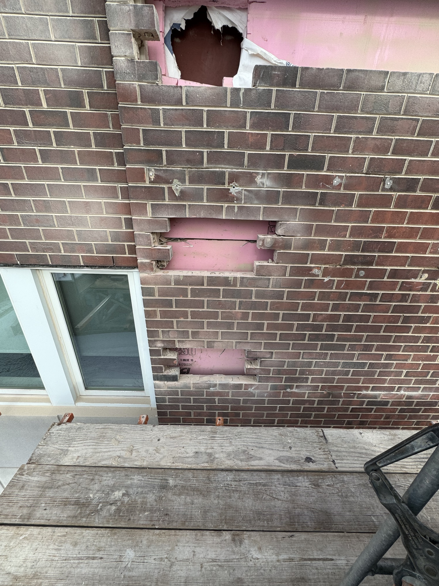 Engineered scaffold access on restricted elevation at 111 Cottage Grove cell tower project