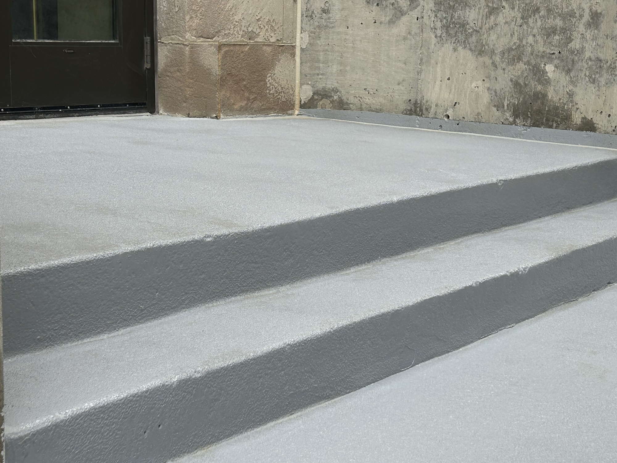 Cleaned and sealed limestone facade at Linn County Courthouse after restoration