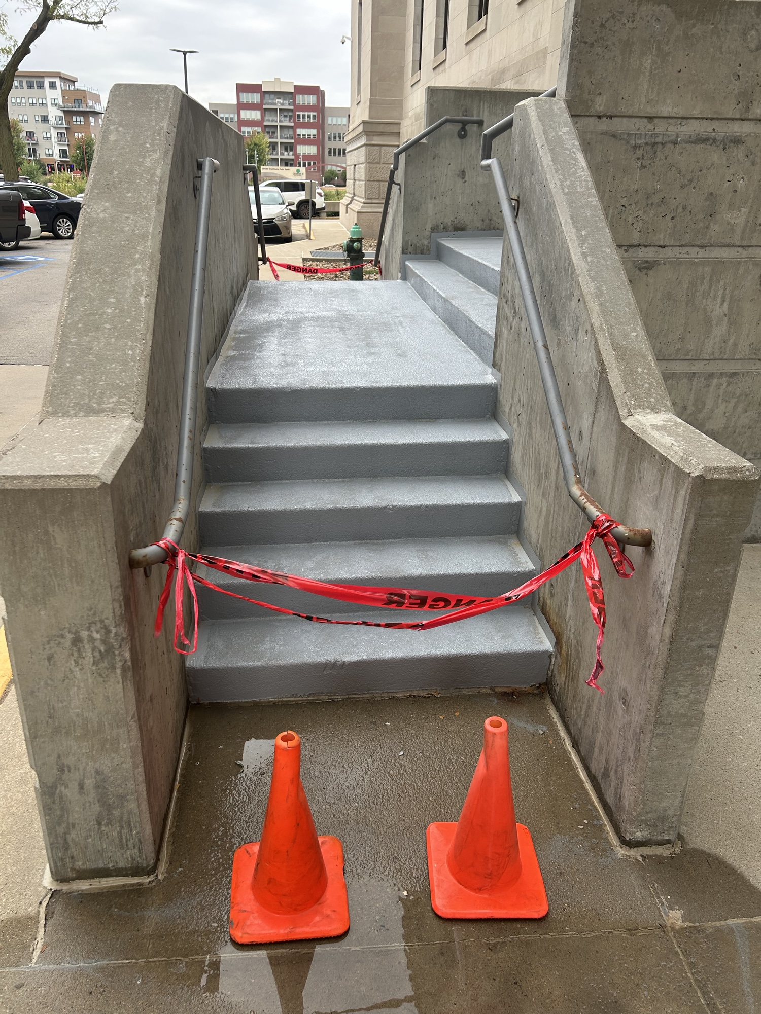 Rebuilt balustrade and plaza masonry at Linn County Courthouse following restoration